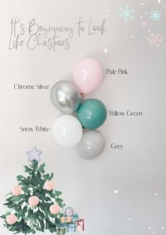 a christmas tree with balloons attached to it's wall and the words its beginning to look like christmas