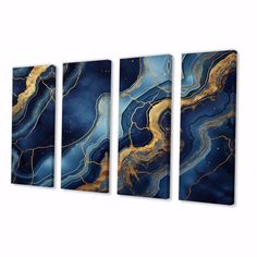 three blue and gold paintings hanging on the wall in front of a white background, each with