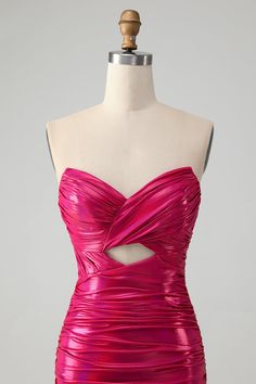 a pink dress on a mannequin dummy