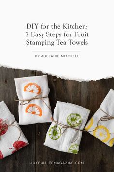 four tea towels tied to each other with the title diy for the kitchen 7 easy steps for fruit stamping tea towels