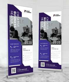 two roll - up banners for the business conference