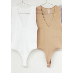 Ribbed Plunging V-Neck Bodysuit In White One Size- Stretchy 2 Clasp Closure At Bottom Tan Low-cut Seamless Bodysuit For Summer, Trendy Seamless V-neck Bodysuit, Trendy V-neck Seamless Bodysuit, Summer V-neck Seamless Bodysuit, Summer Seamless V-neck Bodysuit, Trendy White V-neck Bodysuit, White Seamless V-neck Bodysuit, V-neck Bodysuit For Spring And Summer, Spring/summer Bodysuit With V-neck