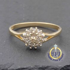 "Restored Vintage Diamond Cluster Ring, Solid 14K Yellow Gold METAL: Solid Yellow Gold, Stamped 14K MAIN GEM: Diamonds-- 19 Round. Total  0.24 carats CURRENT RING SIZE:  7 (Expert resizing service available. Safe resize range for this ring: 5--9. See below to purchase resizing.) APPRAISED VALUE: $925 In this ring, a split shank style opens up to the center cluster of diamonds. A total of nineteen diamonds are arranged in a cluster, as a double halo around the dainty center diamond. This is a qua 14k Gold Cluster Diamond Ring With Prong Setting, Classic 14k Gold Cluster Diamond Ring, Yellow Gold Cluster Promise Ring, Yellow Gold Cluster Ring For Promise, Yellow Gold Diamond Cluster Ring For Anniversary, Yellow Gold Cluster Diamond Ring For Anniversary, Gold Cluster Diamond Ring With Brilliant Cut, Formal Cluster Diamond Ring With Halo Setting, Gold Cluster Rings With Brilliant Cut