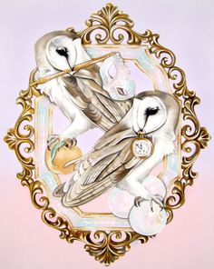 two birds sitting on top of each other in a gold and white frame with an ornate border around them