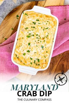 a casserole dish on a cutting board with the title maryland crab dip