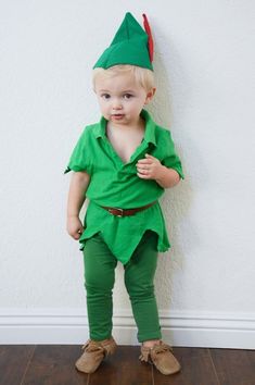 a little boy dressed up as the tinkerbell for st patrick's day