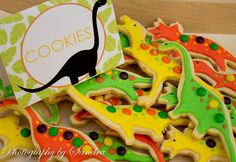 cookies decorated like dinosaurs with a name tag