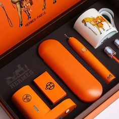 an assortment of orange items in a box