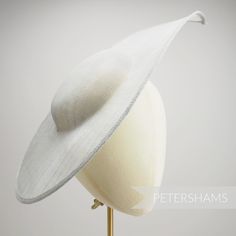 Get Royal Ascot ready with this extra large pointed tip Pale Grey sinamay fascinator base! Made from a triple layer of stiffened sinamay millinery fabric and is ideal for making an instant hat. This shape has a lovely pointed tip and a shallow crown. Get creative by positioning it at different angles on the head! Just add a headband for securing to the head (not included but available in our shop!) *This is not a fitted hat! You will need to sew in a headband or comb to attach it to your head* M Sinamay Fascinator With Curved Brim For Royal Ascot, Fitted Sinamay Costume Hat For Church, Sinamay Fascinator With Curved Brim For Races, Brimmed Sinamay Fascinator For Church, Sinamay Church Hat With Curved Brim, Fitted Sinamay Fascinator For Church, Fitted Sinamay Hat For Church, Church Hat In Sinamay, Sinamay Mini Hat For Church