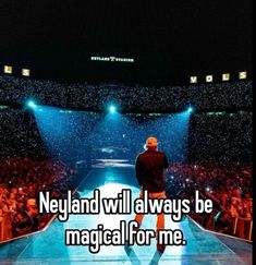 a man walking down a runway with the words neland will always be magic for me