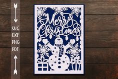 a paper cut christmas card with the words merry and snowflakes in white on a blue background