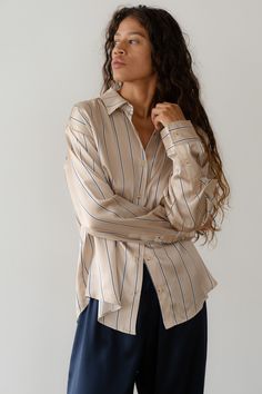 The Silk Pinstripe Shirt is crafted from our luxe 100% Silk fabric. Featuring a relaxed fit, two-buttoned cuffs, and tortoise buttons. Made in Los Angeles Upcycled Tote, Pinstripe Shirt, Winter Shopping, Los Angeles Shopping, Summer Set, Silk Charmeuse, Eco Friendly Fabric, Polar Fleece, Silk Fabric