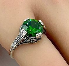 Vintage Sparkly Vivid Green Solitaire Simulated Emerald In 925 Solid Sterling Silver Filigree Ring. Excellent Condition, Satisfaction Guaranteed! May Birthstone Esmeralda Elegant Filigree Emerald Ring For Formal Occasions, Elegant Formal Emerald Ring With Filigree, Elegant Formal Emerald Filigree Ring, Silver Emerald Ring With Round Stone For Formal Occasions, Formal Silver Ring With Round Emerald Stone, Elegant Green Filigree Ring For Anniversary, Filigree Ring For May Birthstone Gift, Elegant Green Filigree Ring, May Birthstone Filigree Ring Gift