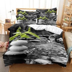 black and white bedding with green plants in the water