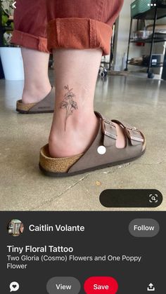 a person with a flower tattoo on their foot and the words, tiny floral tattoo