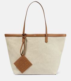 Leather-trimmed canvas tote bag in neutrals - Toteme | Mytheresa Neutral Bag, Canvas Bag Design, Linen Bag, Fabric Trim, Leather Items, Canvas Tote Bag, Free Bag, Canvas Bag, Womens Tote Bags