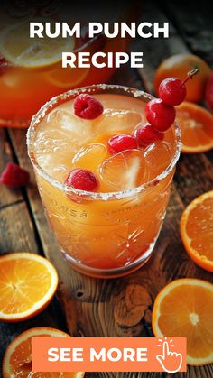 an orange rum punch recipe with cherries on the rim