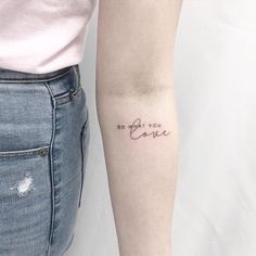 a woman's arm with a tattoo that says do what you love on it