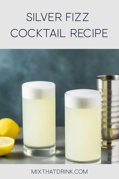 silver fizz cocktail recipe with lemons on the side and two glasses next to it