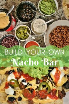 the nacho bar is loaded with lots of toppings