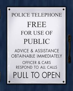 a public phone booth with a free for use sign