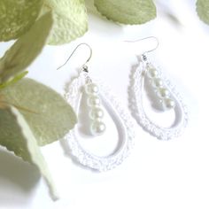 Lace Pearl Earrings Length Aprox 3 inches Light Weight Sterling Silver Ear wire Handmade crochet lace design String of 4 pearls dangle in the middle It's a special day and these earrings are the perfect finishing touch! These gorgeous earrings will give your bridal look an extra touch of sophistication and glamour. They are so elegant and timeless, you won't regret adding them to your wedding day ensemble! Whether you're dressing up for a special occasion or just want to add a touch of glam to a Elegant White Crochet Lace Jewelry, Elegant Crochet Dangle Earrings, Bridal Look, Drops Design, Crochet Techniques, Lace Design, Gorgeous Earrings, Bridal Looks, Ear Wire