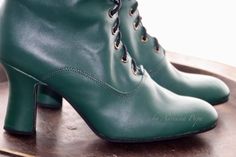 "Request a Custom Order and have something made just for you! Limited edition fabric For wider feet , strong calf and for narrow feet also. This is an individual boots handcrafted. All materials very qualitative. Italian Emerald Green leather and suede leather inside. Are issued by limited series. Model inspired from 1900 Victorian boot style. Are issued by limited series. Ankle height: height of the heel 2.6\" inch/ 7 cm length of the boot from the bottom of the sole (at the heel) to the top 7\ Fitted Closed Toe Boots With Rubber Heel Cap, Green Boots With Reinforced Heel And Closed Toe, Fitted Green Boots With Leather Sole, Green Boots With Reinforced Heel And Fitted Design, Green Fitted Boots With Reinforced Heel, Fitted Green Boots With Reinforced Heel, Fitted Green Boots With Almond Toe, Fitted Green Almond Toe Boots, Green Leather Boots