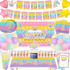 a birthday party set up with balloons, cake and other items for a child's birthday