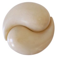 an image of a cream colored object on a white background