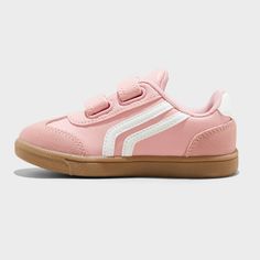 Add some throwback vibes to your little one's shoe wardrobe with these Dakota Retro Court Sneakers from Cat & Jack™. These closed-toe sneakers boast a faux-leather upper, round toe, and soft polyester mesh fabric insole and lining. Enhanced with a double-strap front with hook-and-loop fastening, the shoes lend an adjustable fit to keep your toddler comfortable all day. Cat & Jack™: Designed for all children so you can trust it's made for yours. Casual Slip-resistant Skate Shoes With Round Toe, Casual Lace-up Sneakers With Soft Sole, Pink Sporty Synthetic Canvas Shoes, Pink Synthetic Sporty Canvas Shoes, Sporty Pink Synthetic Canvas Shoes, School Skate Shoes With White Rubber Sole, White Sole Skate Shoes For School, School Skate Shoes With Rubber Sole, Pink Sporty Canvas Shoes With Gum Sole