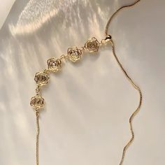 ✦ Adorn yourself with the beauty of nature with our Gold Plated Dainty Pearl Flower Adjustable Lariat Necklace. This stunning piece features a delicate gold flower charm suspended from an adjustable chain, allowing you to find the perfect length for your neckline. The intricate details of the flower charm add an elegant touch to any outfit, making it a versatile accessory for both casual and formal occasions. Treat yourself or surprise someone special with this charming and timeless piece of jew Elegant Adjustable Flower Necklace With Clavicle Chain, Adjustable Elegant Flower Necklace, Elegant Adjustable Clavicle Chain Flower Necklace, Rose Gold Flower Shaped Jewelry With Adjustable Chain, Rose Gold Flower-shaped Jewelry With Adjustable Chain, Delicate Adjustable Necklace With Flower Charm, Adjustable Flower Clavicle Chain Jewelry, Adjustable Clavicle Chain Jewelry With Flower Shape, Dainty Gold Resizable Necklaces