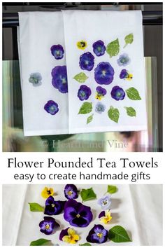 two tea towels with purple pansies and green leaves on them