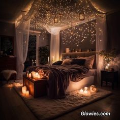 a bedroom with lights on the ceiling and a bed covered in blankets next to a window