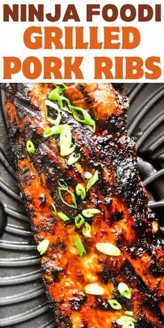 the grilled pork ribs are topped with green onions