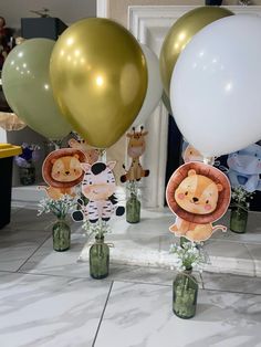 there are many balloons that have animals on them