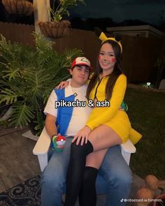 two people dressed up as pokemon and ash sitting on a bench in front of a house