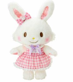 a white stuffed animal wearing a pink and white checkered dress with a bow on it's head