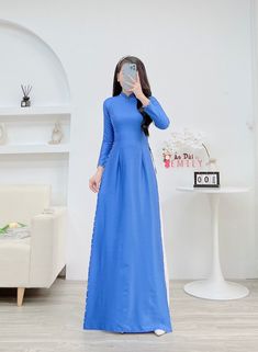 🌻Material: Lụa vân gỗ 🌻Stretchy level: 2/10 🌻 The measurement of this ao dai (long dress) is in Vietnamese size (American size tends to be bigger for the same size). Please LOOK AT THE SIZE CHART CAREFULLY BEFORE ORDERING. There might have some chalk writings on the fabric due to making process. These marks can be washed away easily. 🌻🌻No returns or exchanges Buyer can contact seller about any issues with an order. 🌸 Follow us Facebook/aodaiemily www.aodaiemily.com 💜 Thank you very much💜 Traditional Blue Ao Dai For Party, Blue Maxi Dress For Wedding, Blue Wedding Maxi Dress, Formal Blue Ao Dai For Spring, Blue Ao Dai For Spring Formal Occasions, Blue Floor-length Ao Dai For Wedding, Elegant Blue Floor-length Ao Dai, Blue Ao Dai For Spring Party, Chalk Writing