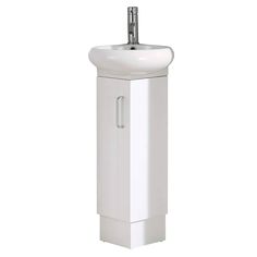 a white pedestal sink sitting next to a wall mounted faucet