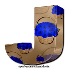 the letter j is made up of blue flowers in a basket and on top of an uppercase