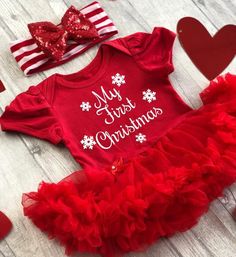 Baby Girl's First Christmas OutfitRed Cotton Soft Short Sleeved tutu romper with Matching Red Sequin Bow Stripey HeadbandWhite glitter lettering saying 'My First Christmas'White glitter snowflakes around the letteringCute outfit for a Baby Girl's First ChristmasAny questions or queries please just message me :) Newborn Christmas Outfit, Christmas Baby Romper, My First Christmas Outfit, First Christmas Outfit, Glitter Snowflakes, Red Tutu, Red Christmas Dress