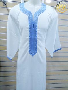 Beautiful Moroccan kaftan in cotton for men. This Moroccan clothing is handmade in soft fabric cotton. This kaftan is very pleasant to wear mainly in summer, at the beach, after a spa, indoor, outdoor, at a party... Very fast to wear, not stick to the skin, this kaftan is a really must have clothing. - Cotton - embroidery - Machine washing Manufactured: Handmade Gender: mens Size: all sizes are available color: ( 1 color is available) Origin: Morocco We ship worldwide Check your shipping address White Cotton Long Sleeve Agbada, Eid Traditional Tunic Kurta, Eid Tunic Kurta For Traditional Ceremonies, Traditional Long Cotton Thobe, Cotton Long Sleeve Kaftan For Traditional Ceremonies, Long Sleeve Cotton Kaftan For Traditional Ceremonies, Bohemian Cotton Thobe For Eid, Bohemian White Thobe With Dabka Detail, Eid Tunic Kaftan For Traditional Ceremonies