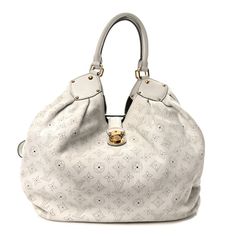 This is an authentic LOUIS VUITTON Mahina XL in White.This is the larger size of this stylish line of bags crafted of classic off white leather. The Mahina leather is almost imperceptibly perforated in the Louis Vuitton monogram across the bag withcowhide leather at the gathered top corners and looping handles. There is a polished brass press lock that opens to analcantara microfiber fabric interior with a zipper pocket. Gathered Top, Dior Jewelry, Oversized Bag, Versace Bags, Wallet Fashion, Hobo Handbags, Luxury Accessories, Polished Brass, Authentic Louis Vuitton