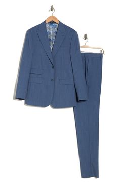 Sophisticated peaked lapels smarten the jacket of this trim-fit suit crafted from a fine wool blend and finished in a handsome windowpane plaid print. 36 1/4" inseam; 7 3/4" leg opening; 10 1/2" rise (size 38R) Jacket has peaked lapels; chest welt pocket; front flap pockets Unhemmed Lined 90% wool, 10% polyester Dry clean Imported Fitted Suiting Fabric Suits For Spring, Fitted Suits In Suiting Fabric For Spring, Fitted Spring Suits In Suiting Fabric, Fitted Spring Suits, Blue Suit With Lapel Collar For Work, Blue Suits With Flat Front For Work, Blue Fitted Suit For Work, Blue Single-button Suit For Work, Classic Blue Pantsuit With Notch Lapel