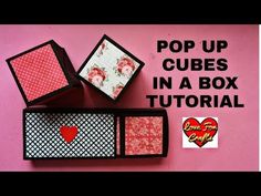 two small boxes with hearts on them and the words pop up cubes in a box