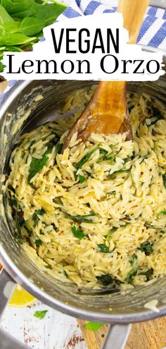 vegan lemon orzo rice in a pot with a wooden spoon on the side