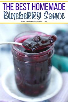 the best homemade blueberry sauce is in a glass jar with a spoon on top