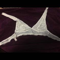 Never Worn. New Without Tags. Halter Bralette White Bra-friendly Low-cut Top, Bra Friendly White Low-cut Top, White Low-cut Bra-friendly Top, White Stretch Lace Bra, White Lace Stretch Bra, White Stretch Bra With Lace Trim, Fitted White Victoria's Secret Bra, White Lace Bra-friendly Top, White Lace Top, Bra Friendly