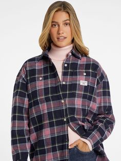 An oversized button-up shirt with dual front pockets features an elongated silhouette with a baggier, boyfriend look. Trendy Shirt With Pockets, Oversized Plaid Shacket Casual Style, Casual Flannel Shirt With Snap Buttons For Work, Oversized Casual Shirt With Patch Pockets, Casual Fall Shirt With Buttoned Pockets, Trendy Shirt With Buttoned Pockets, Casual Collared Flannel Shirt For Work, Trendy Relaxed Fit Flannel Shirt With Pockets, Trendy Shirt For Casual Fall Events