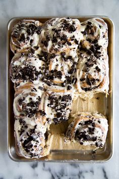 cookies and cream bread rolls in a baking pan on a marble counter top with text overlay